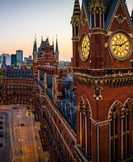 St Pancras Station clock tower at dusk, London