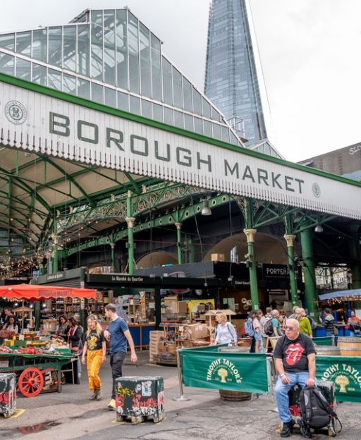 Borough Market entrance with the Shard visible behind the Victorian iron structure