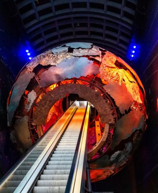 The Earth Hall escalator at the Natural History Museum in London — one of the best free attractions for families visiting with kids