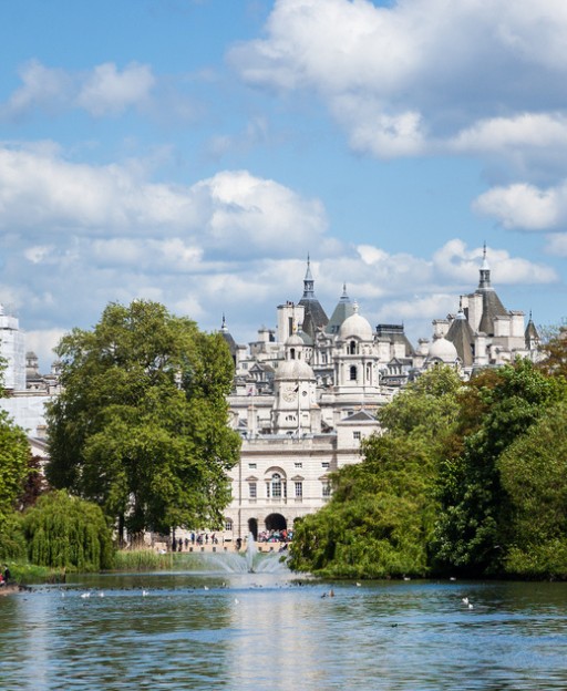 St James's Park lake with the Horse Guards buildings rising above the treeline, central London