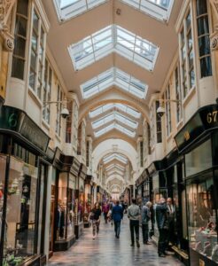 Burlington Arcade in Mayfair, London — a historic covered shopping arcade with glass ceiling and elegant boutiques