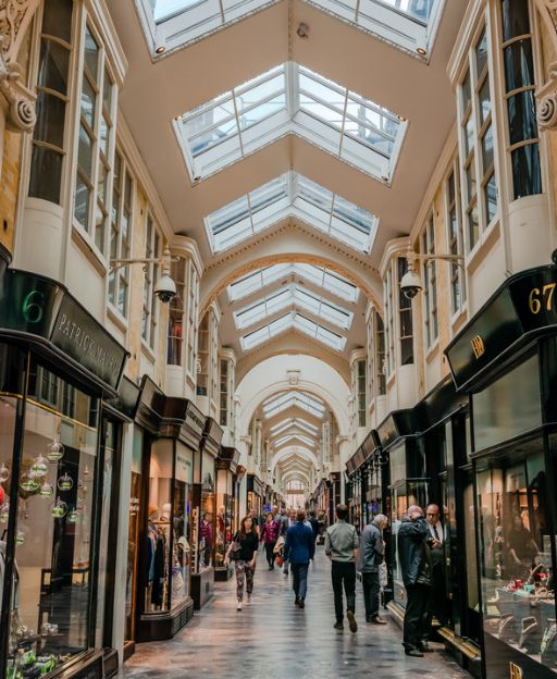 Burlington Arcade in Mayfair, London — a historic covered shopping arcade with glass ceiling and elegant boutiques