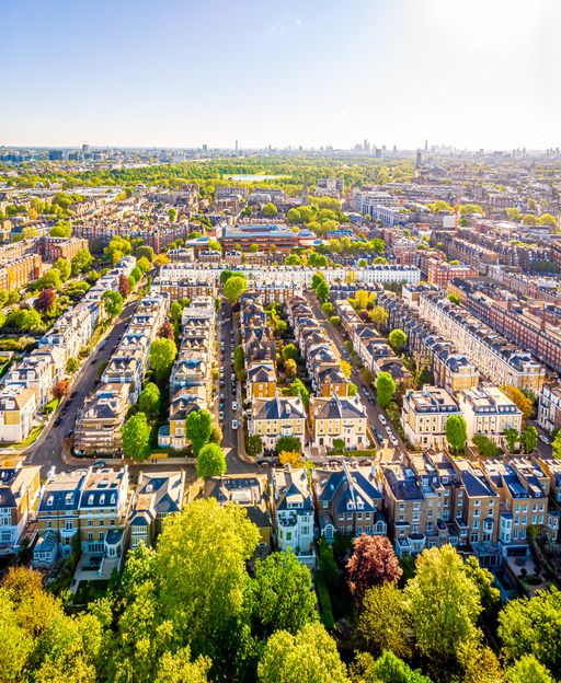 Aerial view of Kensington's Georgian terraces and tree-lined streets, London