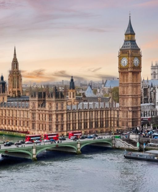 Big Ben and the Houses of Parliament at sunset, viewed across the River Thames from Westminster Bridge