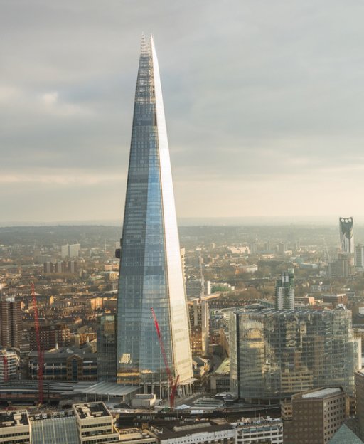 The Shard tower above the London skyline on an overcast November day with grey winter clouds