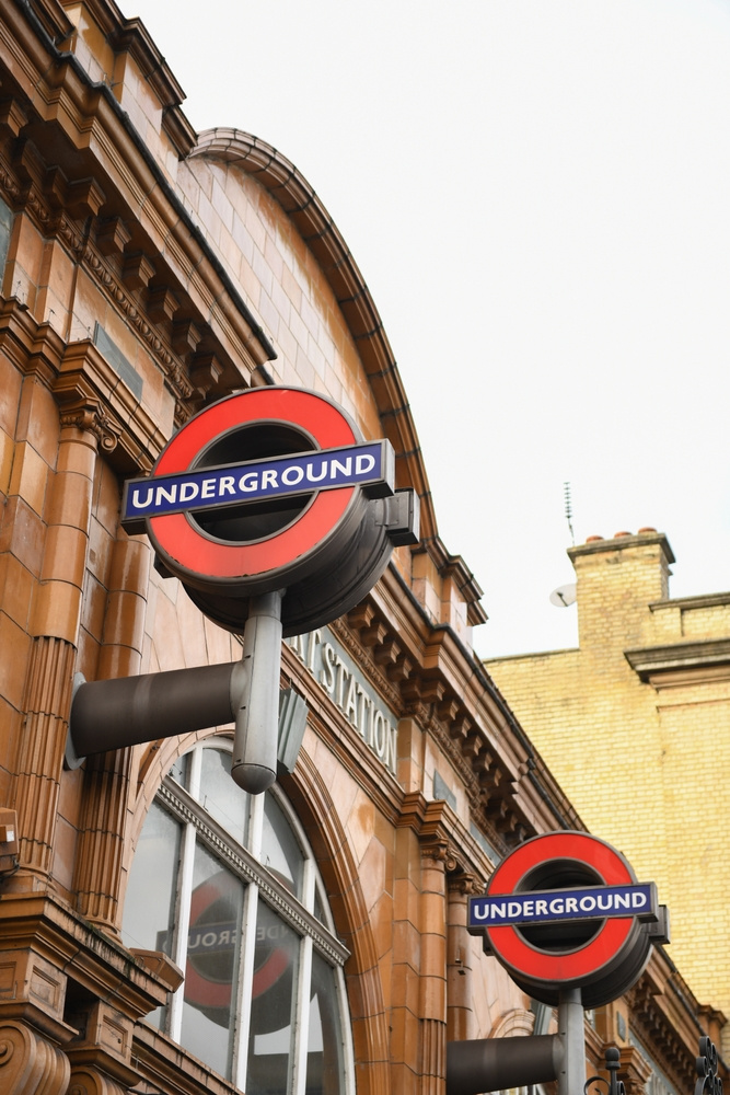 London Underground station entrance with iconic roundel signs — stations like this became lifelines during the Blitz