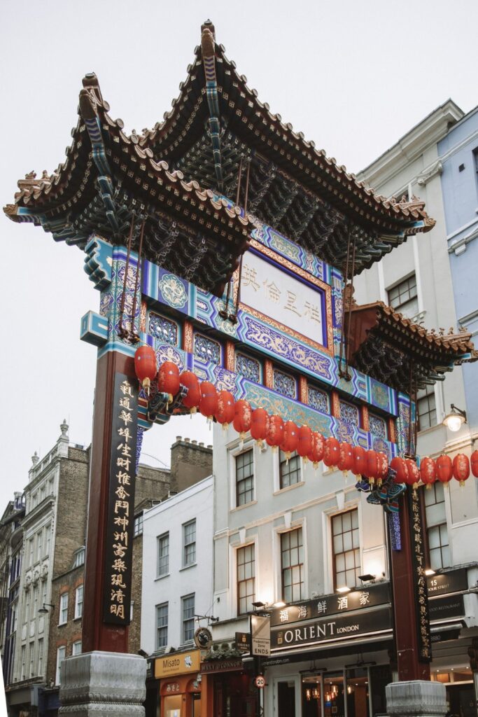 A Chinese gate hung with red lanterns in London's Chinatown, Soho