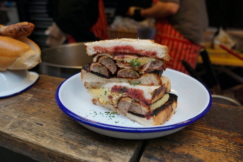A sausage sandwich from a street food stall at Maltby Street Market, Bermondsey