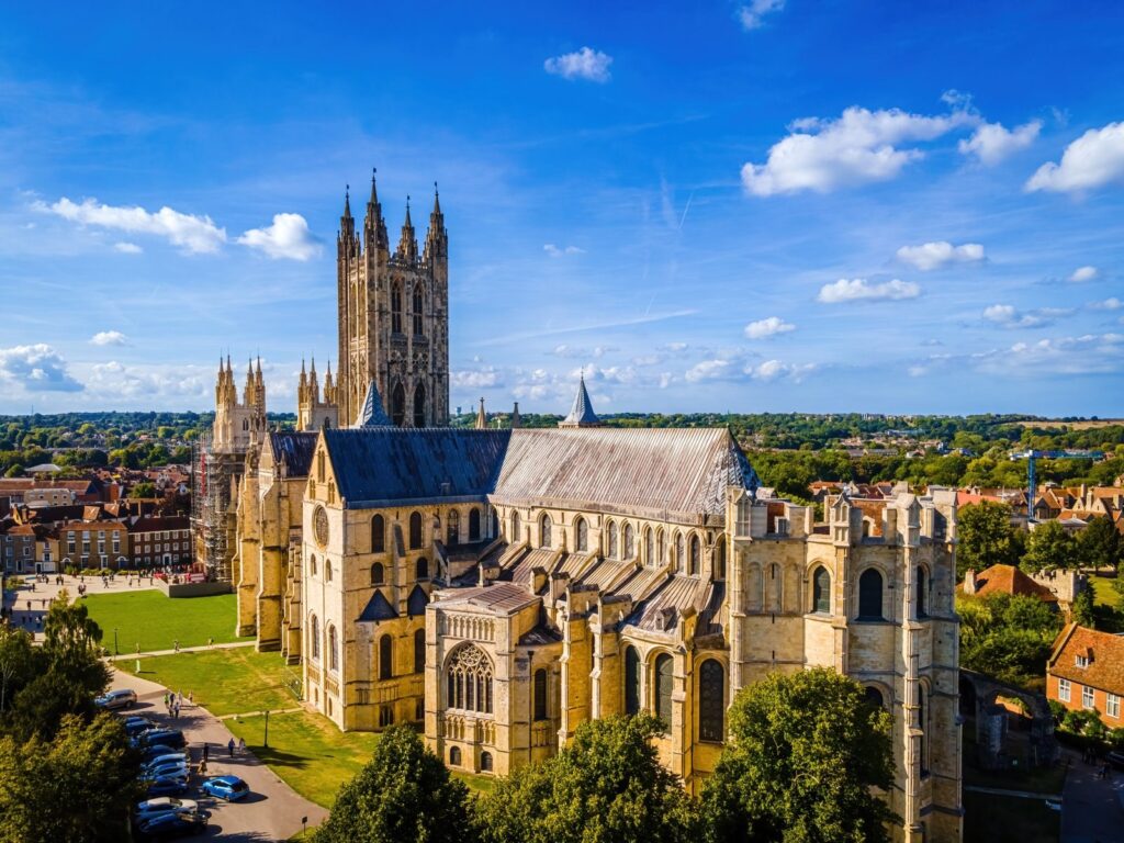Aerial view of Canterbury Cathedral with its central tower and the city around it, Kent