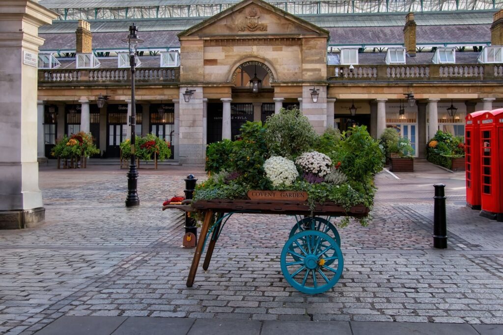 A flower barrow on the cobbles of Covent Garden Piazza