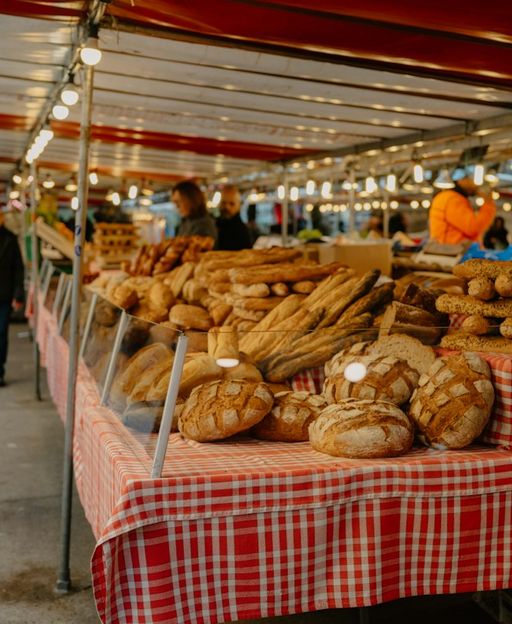 Fresh bread and pastries on display at a London food market stall