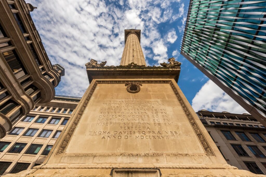 Looking up the Monument to the Great Fire of London from its base