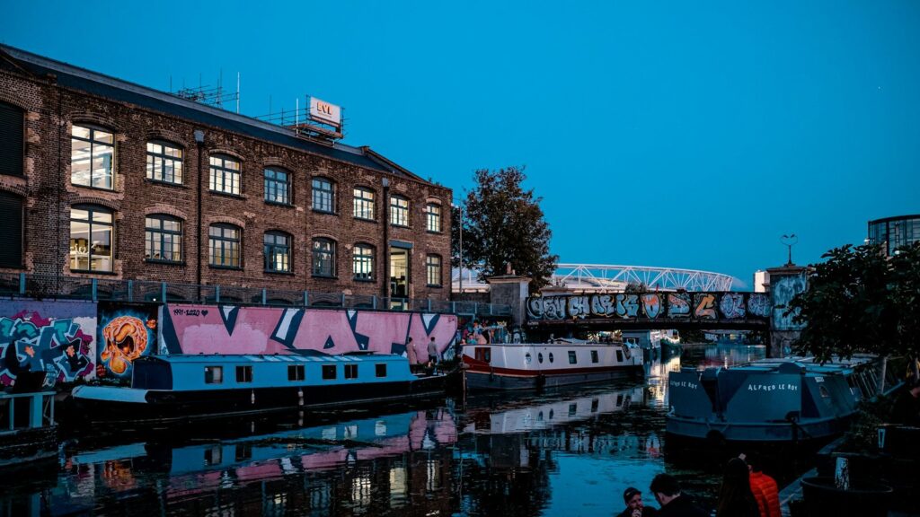 Narrowboats and graffiti along the canal at Hackney Wick