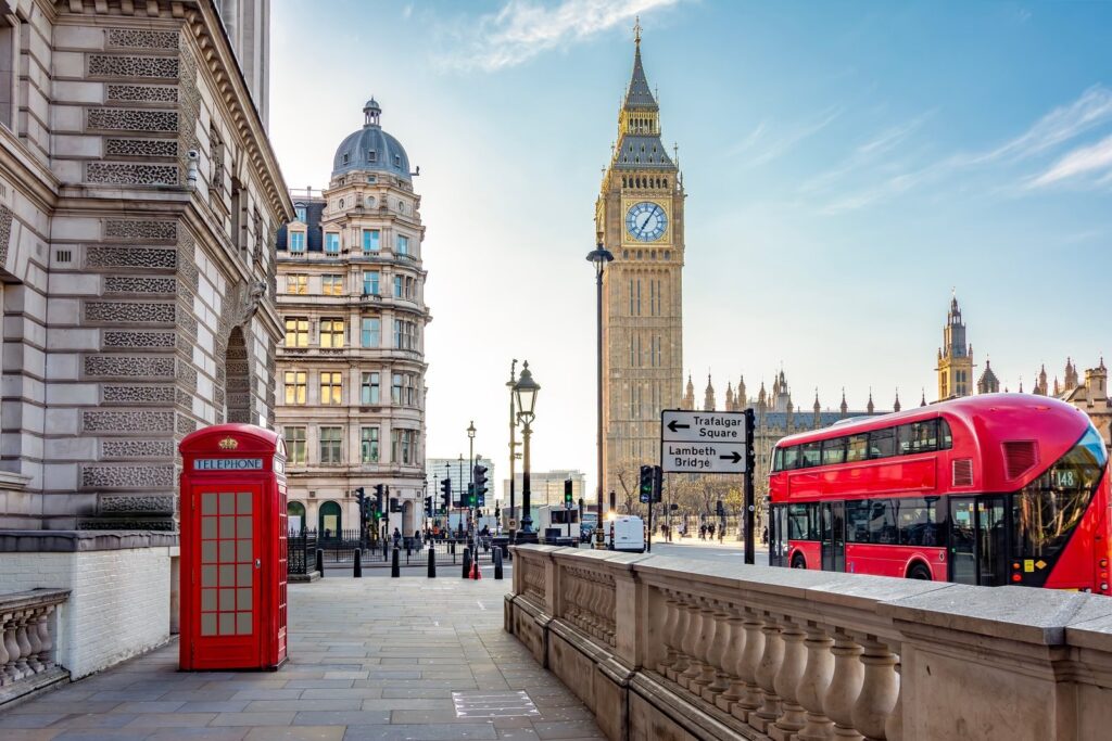 Red phone box and double-decker bus near Big Ben