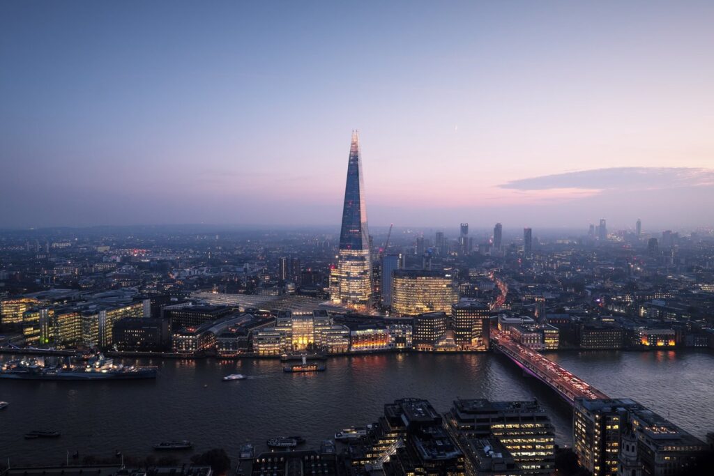 The Shard and the London skyline over the Thames at dusk