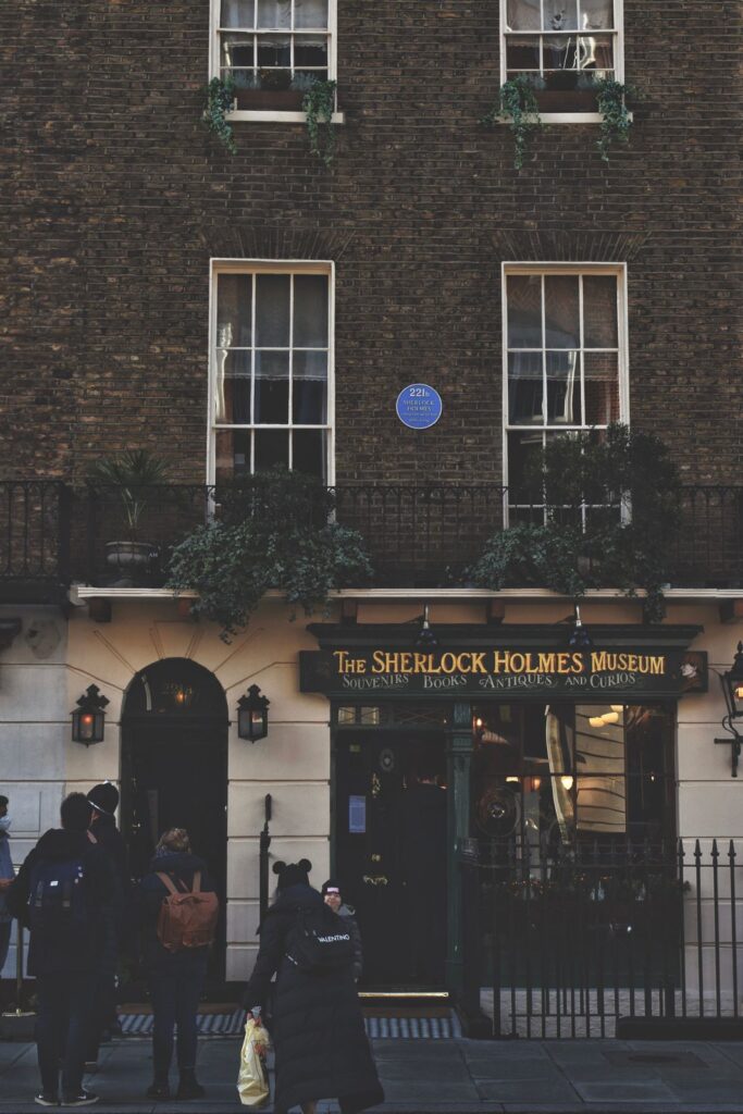 Front of the Sherlock Holmes Museum on Baker Street, London, with visitors outside