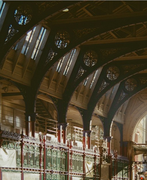 Ornate Victorian iron arches and railings at Smithfield Market, London