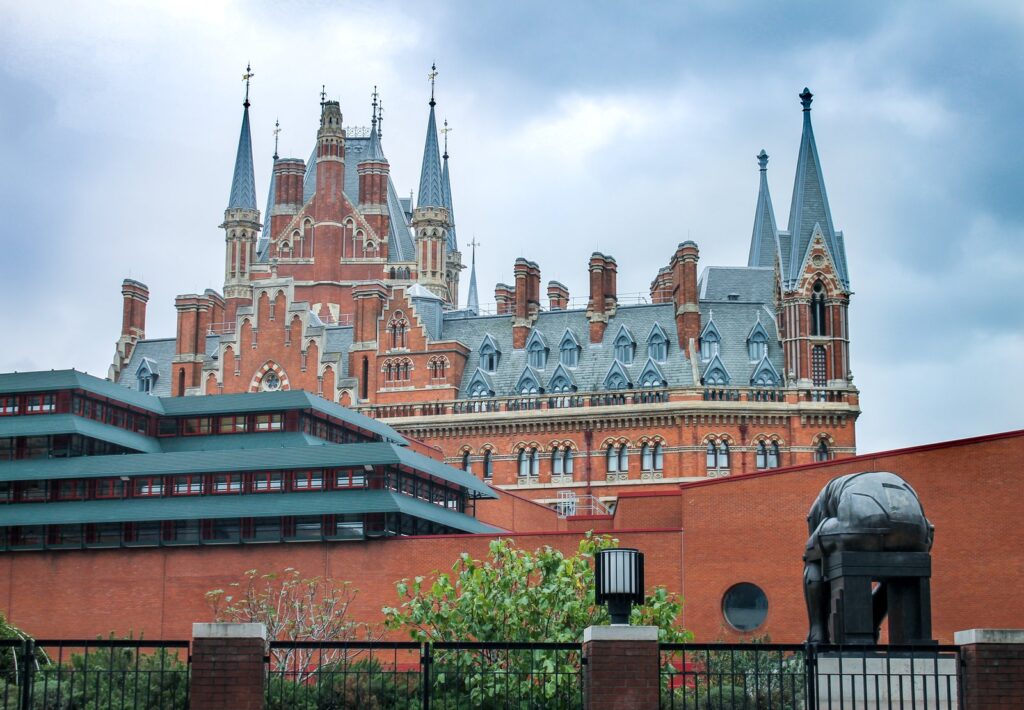 The red-brick Gothic towers and spires of the St Pancras Renaissance Hotel, the former Midland Grand Hotel, rising behind the British Library in London