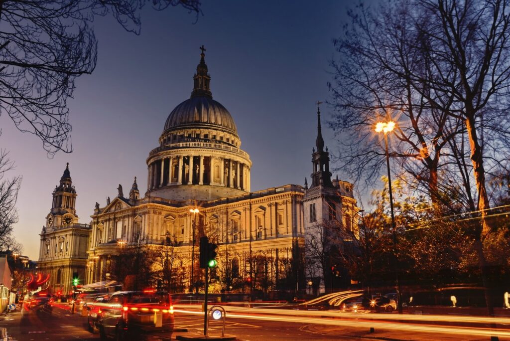 Floodlit St Paul's Cathedral at dusk