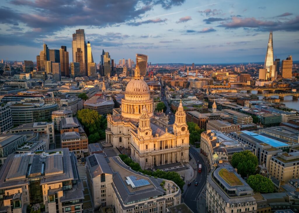Aerial view of St Paul's Cathedral with the City of London towers and the Shard behind