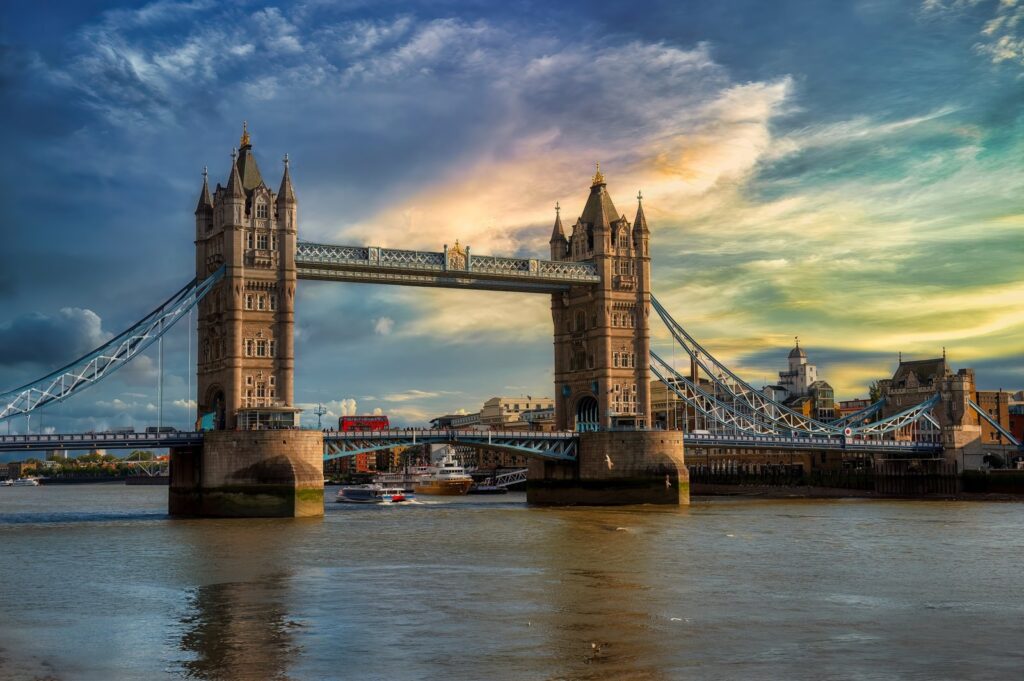 Tower Bridge seen side-on from the Thames at dusk