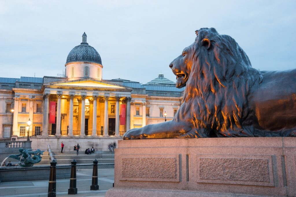 Bronze lion in front of the National Gallery, Trafalgar Square, London